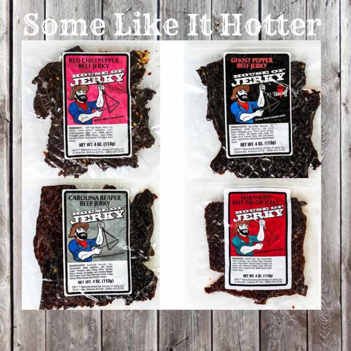 4 Jerky Bags on a wooden background with the words Some Like It Hotter at the top