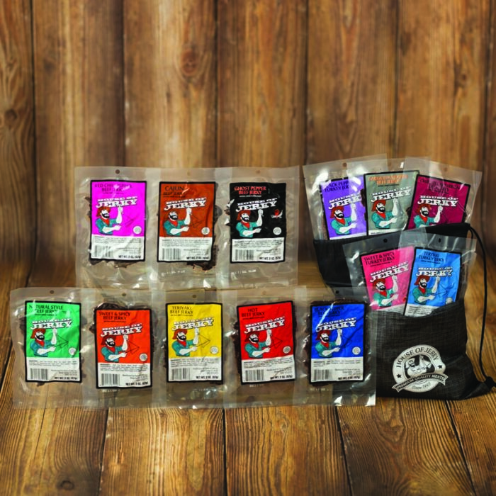 black drawstring bag with 13 varied bags of 2oz beef and turkey jerky flavors