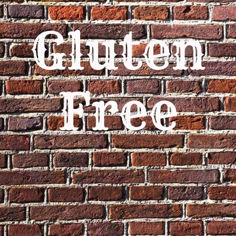 the words gluten free on a brick background