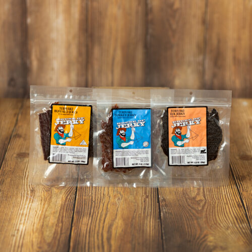 three bags of teriyaki flavored jerky - turkey, elk and buffalo