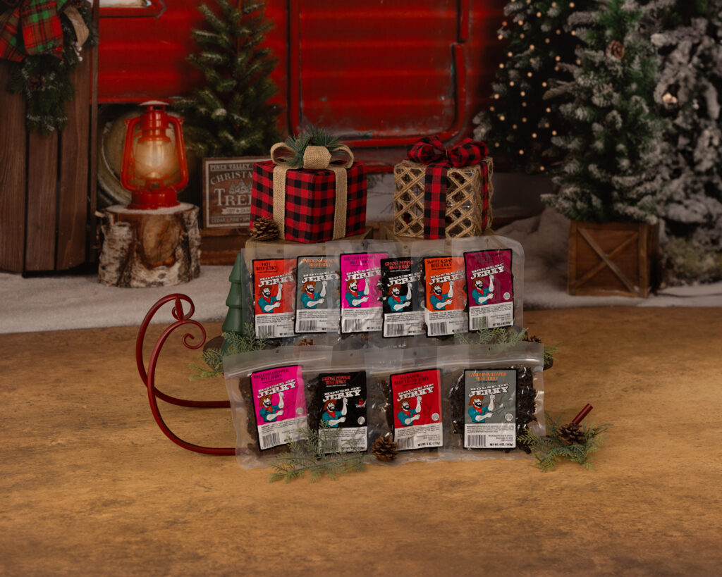 Heat Seekers random assortment of spicy jerky on a holiday background